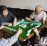 莞城敬老院里，几位老人聚在一起搓麻将消遣。东莞时报资料图 - News.Timedg.Com