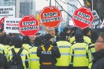 韩国市民团体22日在政府大楼前示威，反对与日本签署《军事情报保护协定》。 - News.Ycwb.Com