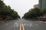 已铺设沥青的人民南路。（王雅　摄） - Meizhou.Cn