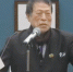 图为APA 酒店社长元谷外志雄讲话的视频截图。 - News.Ycwb.Com