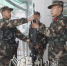 图为武警新战士走上执勤哨位。（林翔 摄） - Meizhou.Cn