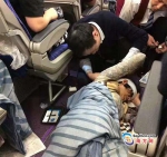外籍乘客在机舱撞头昏倒 佛山针灸医生助其脱险 - 新浪广东