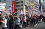 资料图片：外国劳务者在东京集会，抗议歧视，要求基本权利。 - 新浪广东