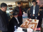 图为国际象棋大师吕钦1对16联袂的比赛现场。　宋秀杰　摄 - 新浪广东