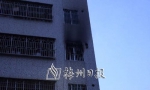 ▲起火处外墙被熏黑。（图片均为李盛华摄） - Meizhou.Cn