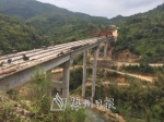 图为该县正在建设中的交通项目——金岗大桥。 - Meizhou.Cn