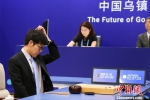 人机大战首盘柯洁微弱劣势惜败AlphaGo 表现仍获赞 - Southcn.Com