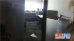 华赢凯来位于银河SOHO 8楼的办公室大门紧闭，里面堆放办公用品。中新经纬 毕彤彤 摄 - News.21cn.Com