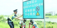 警方在事故多发河段增设警示牌。 - 新浪广东