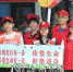 文明交通志愿者走上街头，倡导文明出行理念。（林翔 摄） - Meizhou.Cn
