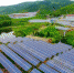 4月27日，航拍下的江西省一废弃矿山光伏电站如深山明镜，熠熠生辉。资料图 - News.21cn.Com