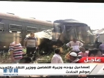 8月11日，在埃及首都开罗，当地电视台在报道亚历山大火车相撞事故。埃及国家电视台11日报道，埃及北部城市亚历山大当天发生火车相撞事故，已致18人死亡，逾50人受伤。 新华社记者 汤洁峰 摄 - 新浪广东