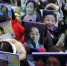 资料图：韩国民众高举慰安妇照片，在日本使馆前集会抗议。 - News.Ycwb.Com