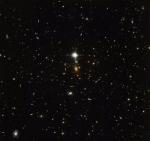 一闪一闪亮晶晶 NASA发布哈勃拍摄星系团照片 - News.Timedg.Com