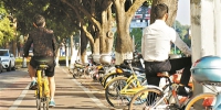 共享单车给市民带来便利的同时也出现了一些问题。 - 新浪广东
