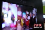 资料图：运营商进行5G技术展示。中新网 吴涛 摄 - 新浪广东