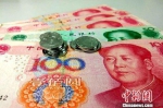 资料图：人民币。 中新网记者 李金磊 摄 - 新浪广东