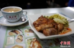 资料图：香港历史悠久的兰芳园茶餐厅。中新社记者 洪少葵 摄 - 新浪广东