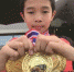 9岁的钟正葳已经获得过不少奖项 东莞时报记者 尹金钟 摄 - 新浪广东