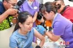 中国内地首针九价HPV疫苗在海南博鳌完成接种 - News.Timedg.Com