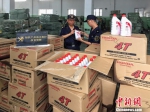 南沙海关查获约1050瓶涉嫌侵犯“HONDA”商标权的润滑油李钊摄 - 广东大洋网