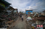 印尼地震海啸死亡人数增至2010人 中国首批援助物资运抵 - News.Timedg.Com