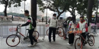 “广马”背后的温馨：60名“单车超人”寒风中清理赛道 - 广东大洋网
