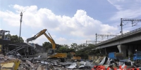 7月26日，广州南站附近一影响高铁运营违建被拆除 - 新浪广东