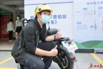 “000001”号牌车主是他！广州首张电动自行车号牌发出 - 广东大洋网