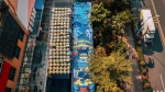 “电竞岛巨幅涂鸦墙”艺术作品（《和平精英》供图） - 新浪广东