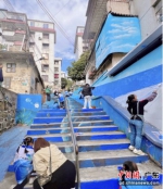 “建设美丽阶梯 美化生活环境——阶梯涂鸦”活动 作者 通讯员 供图 - 中国新闻社广东分社主办